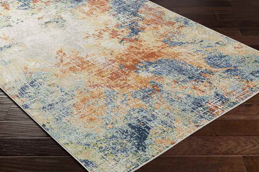 Rippey Coastal Burnt Orange Area Rug