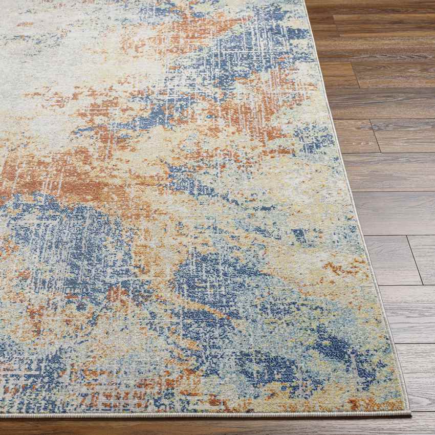 Rippey Coastal Burnt Orange Area Rug