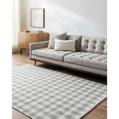 Jamaris Solid and Border Ivory Area Rug