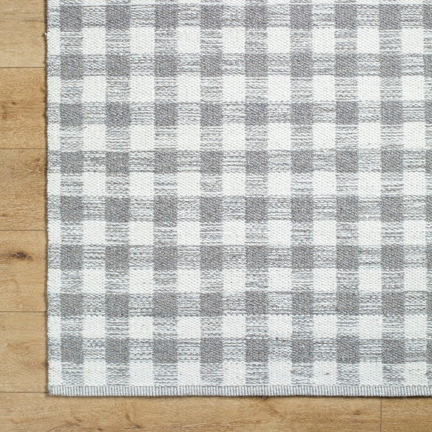 Jamaris Solid and Border Ivory Area Rug