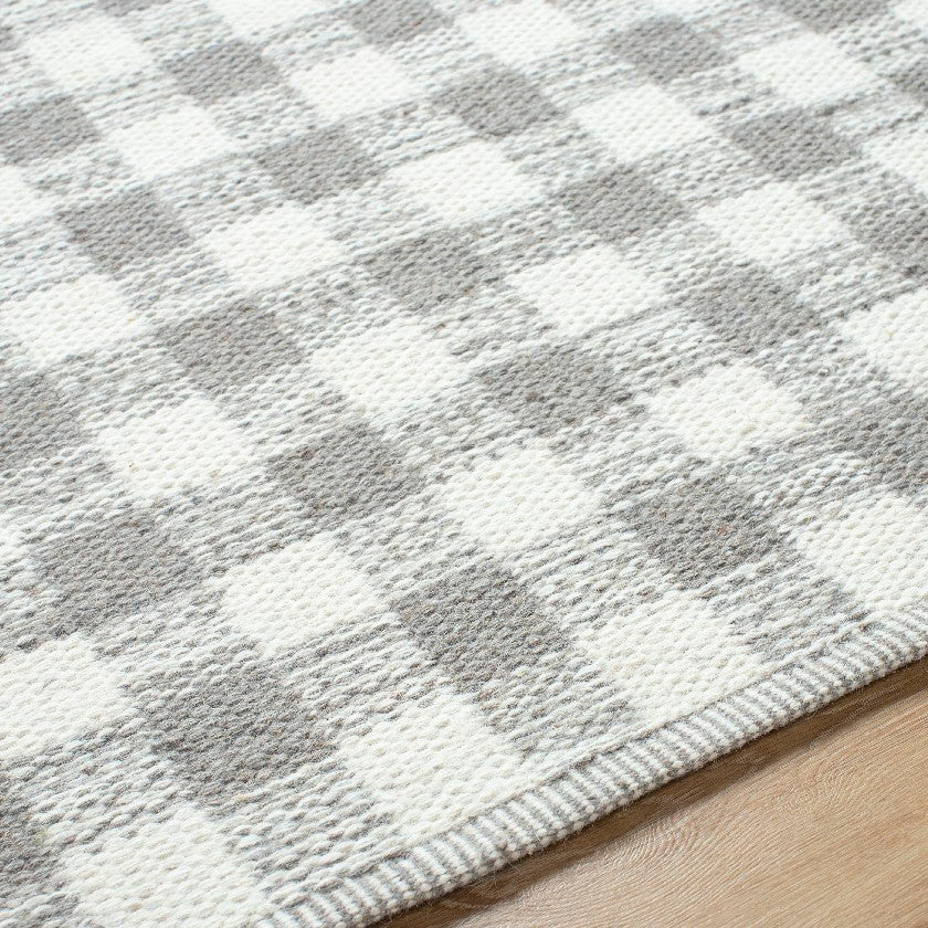 Jamaris Solid and Border Ivory Area Rug