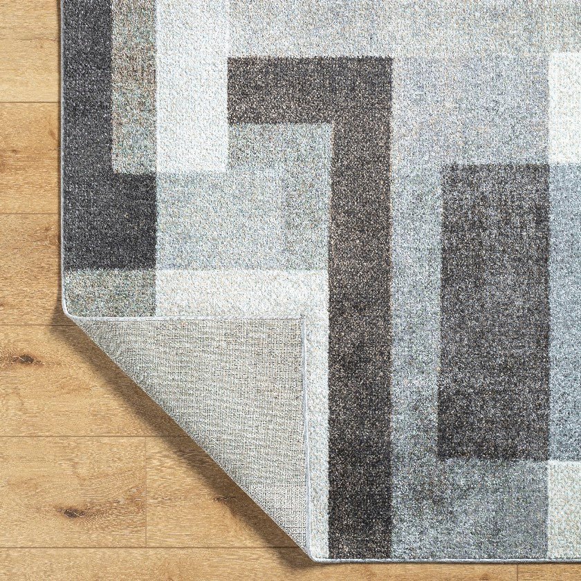 Olatokunbo Modern Black Area Rug