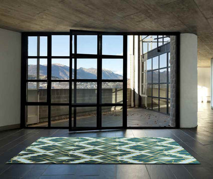 Adeline Global Teal Area Rug