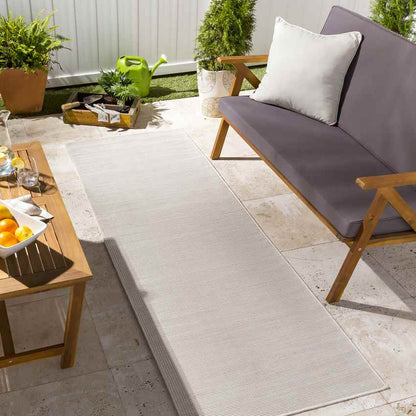 Tonsel Traditional Cream Area Rug