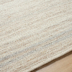 Janmichael Solid and Border Tan Area Rug