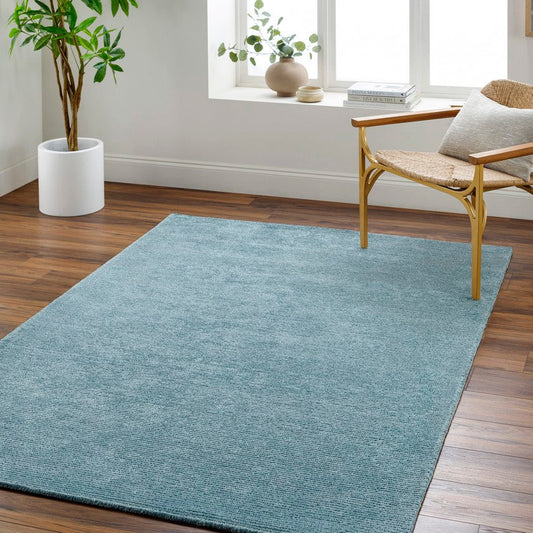 Jett Solid and Border Denim Area Rug